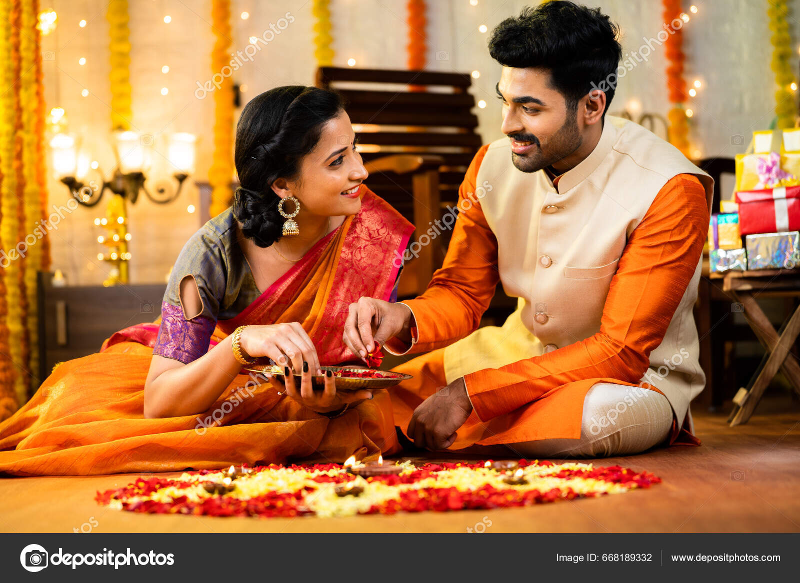 Happy Indian Couple Traditional Ethnic Wear Decorating Rangoli