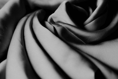 Mavi ipek kumaş. İpek kumaş dokusu. ipek arka plan. İpeksi parlak kumaş.