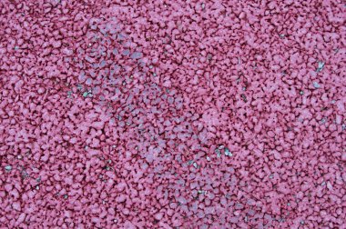 Arka plan esprisi, otoparkta pembe boyalı kaldırım. Tasarım için soyut arkaplan ve doku.