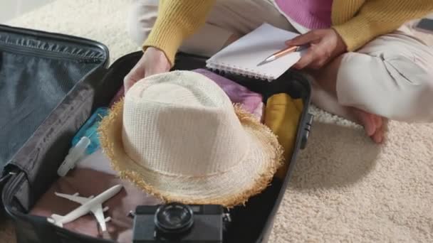 Making Check List Things Pack Travel Woman Writing Paper Take — Stock Video