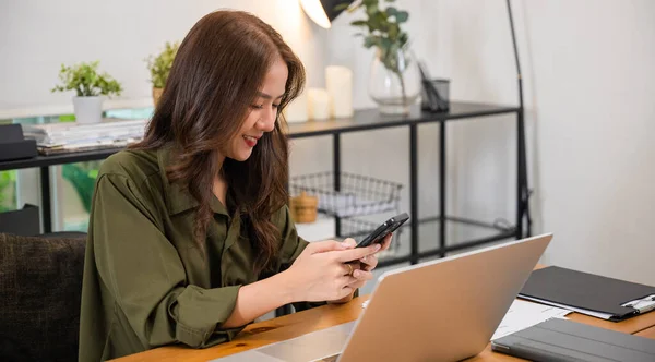 Asian Business Woman Using Laptop Checking Smartphone Indoors Home Office — Photo