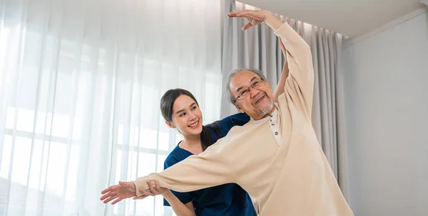 Rehabilitation Disabled People Old Senior Man Enjoys Training Physiotherapist Outstretched — Stock Photo, Image