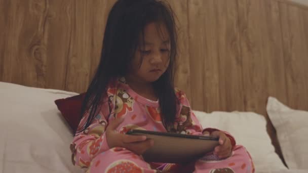 Kid Watching Videos Cartoons Online Bedroom Home Little Asian Girl — Wideo stockowe