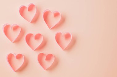 Happy Valentines Day. Flat lay pink ribbon heart shaped on pastel pink background, Festive background with copy space, Mothers day, Womans day