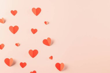 Beautiful red paper hearts shape cutting pastel pink background, Happy mother day, Symbol of love paper art elements with place for text, Happy Valentine Day concept