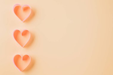 Happy Valentines Day. Top view flat lay pink ribbon heart shaped decorative symbol on pastel background, love romance concept, template banner design with copy space, Mother, Woman day