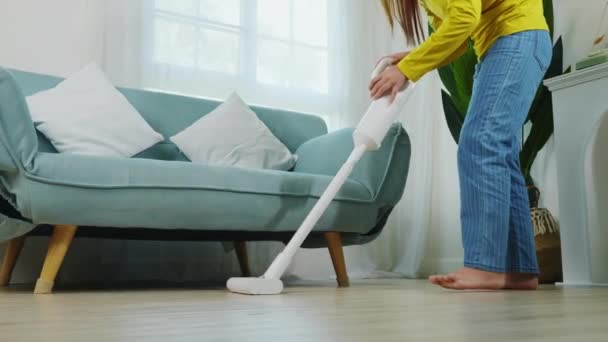 Housewife Female Dust Cleaning Floor Sofa Couch Furniture Vacuum Cleaner — Vídeo de Stock