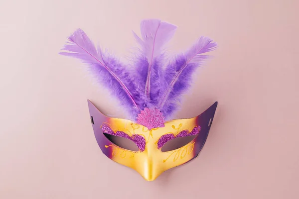 Venetian mask, Carnival mask for Mardi Gras celebration isolated on purple background banner design with copy space, jewish holiday, Purim in Hebrew holiday carnival ball, Happy Purim carnival concept
