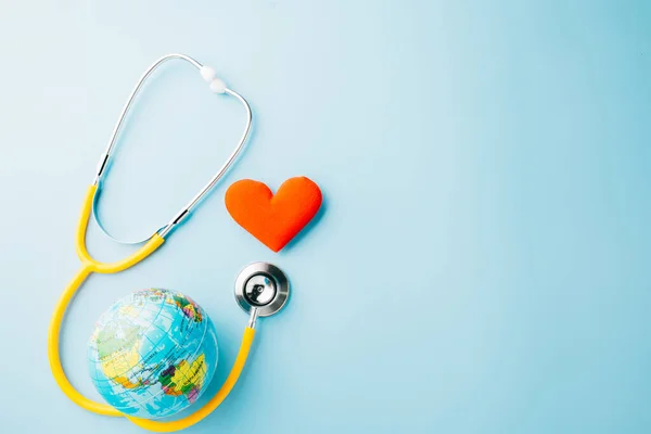 World Health Day Yellow Doctor Stethoscope World Globe Red Heart — Zdjęcie stockowe