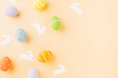 Easter eggs bunny and rabbit white paper cut isolated on pastel background copy space, Funny decoration, Creative composition banner web design holiday background, Happy Easter Day, flat lay top view