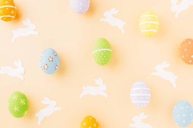 Easter eggs bunny and rabbit white paper cut isolated on pastel background copy space, Funny decoration, Creative composition banner web design holiday background, Happy Easter Day, flat lay top view