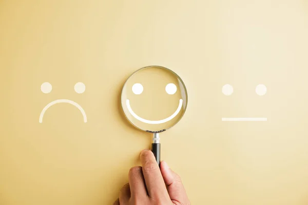Hand Holding Magnifier Happy Smiley Face Icon Emotions Good Feedback — Stock Photo, Image