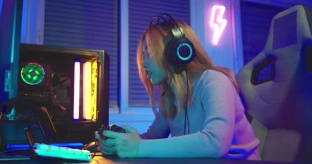 Game Angry Asian Gamer Wearing Gaming Headphones Playing Joystick Console — Wideo stockowe