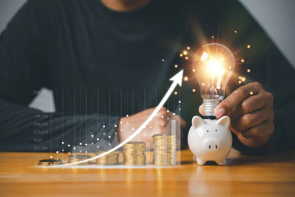 Saving Money Lightbulb Concept Hand Holding Light Bulb Coins Stack — Stock Photo, Image