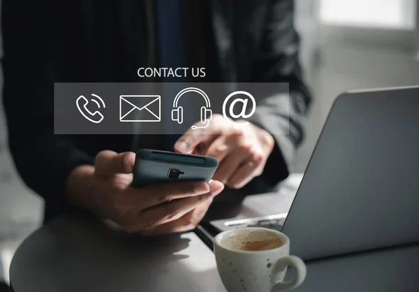 A website contact us page concept featuring customer support hotline connections. Icons of email, phone call, and address symbolize effective communication. Banner for online business and marketing
