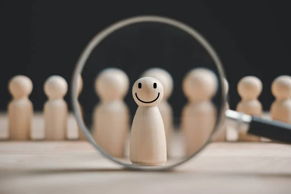 HR search concept, Magnifying glass emotion face icon. Talent management, HRM, HRD. Human resources officer looks for leader and CEO. HR manager selects an employee. Leader stands out from crowd.