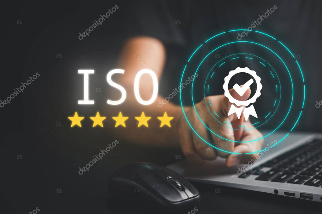 Businessman with laptop computer showcasing ISO certification and document management system. Quality assurance and standard compliance present. Top service with internet security is guaranteed.
