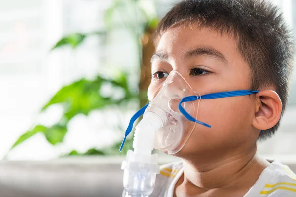 Asian Child Using Nebulizer Mask Equipment Alone Have Smoke Kid — Stock fotografie