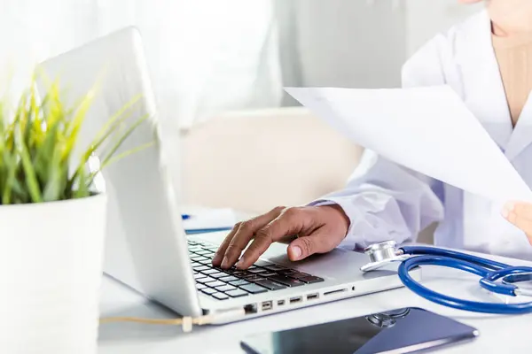 Closeup Doctor Nurse Woman Uniform Stethoscope Typing Information Patient Prescription — Fotografia de Stock