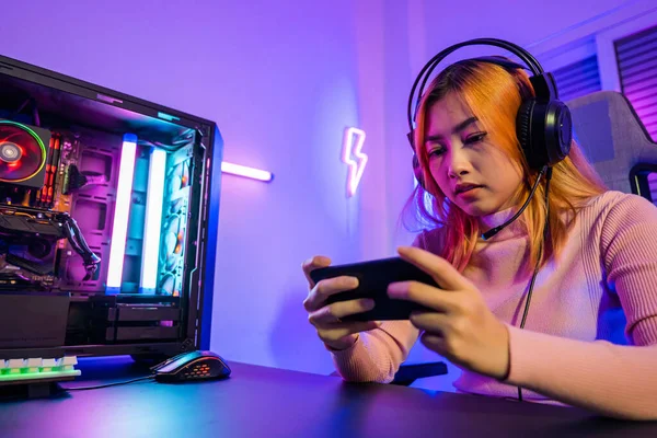 Happy Gamer Playing Video Game Online Smartphone Neon Lights Asian — Fotografia de Stock