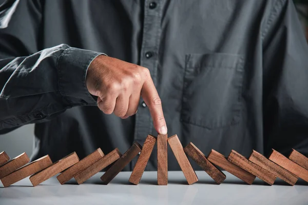 Finger Businessman Pointing One Wooden Stopping Domino Effect Stopped Close — Stock Photo, Image