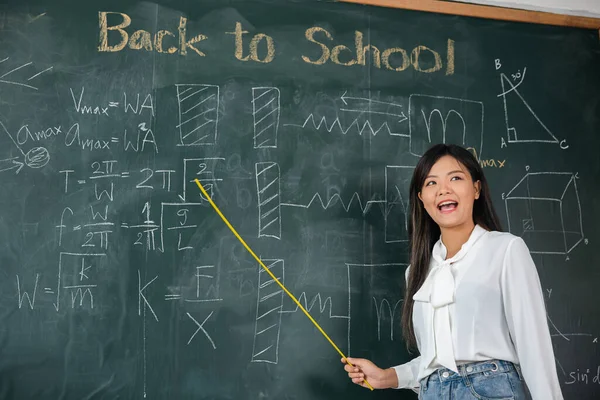 Back School Concept Asian Female Teacher Smiling Wooden Stick Pointing — Stock fotografie