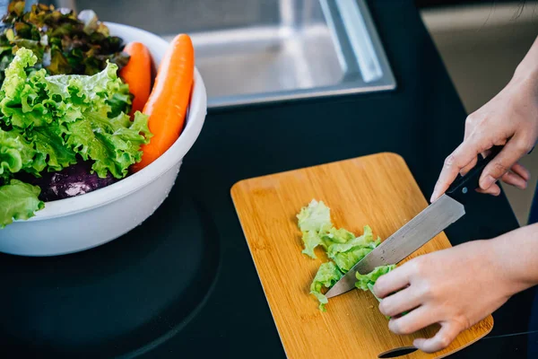 Close Unrecognizable Woman Blue Apron Cutting Fresh Vegetables Healthy Salad — Stock Photo, Image