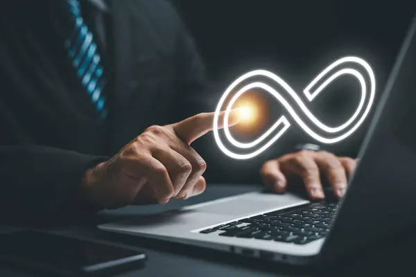 Businessman Emphasizes Infinity Symbol Indicating Unlimited Connection Data Technology Cyber — Stock Photo, Image