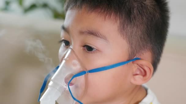 Asian Child Using Nebulizer Mask Equipment Alone Have Smoke Kid — Video Stock