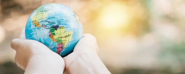 In honor of World Earth Day, embrace a green leaf and the globe, symbolizing Green Energy, ESG, and Environmental Care. Take on global responsibility for a sustainable and clean environment.