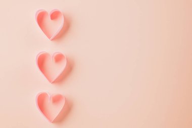 Happy Valentines Day. Flat lay pink ribbon heart shaped on pastel pink background, Festive background with copy space, Valentines day concept