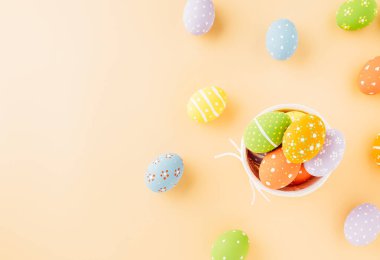 Colorful easter eggs isolated on pastel background with copy space, Funny decoration, Creative composition banner web design holiday background, Happy Easter Day greeting card, flat lay top view