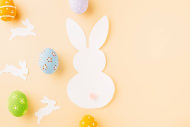 Easter eggs bunny and rabbit white paper cutting isolated on pastel background, Funny decoration, Festive composition banner web design holiday background, Happy Easter Day