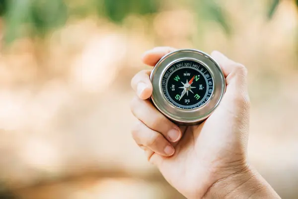 Forest Hiker Conquers Confusion Holding Compass Traveler Hand Compass Signifies — Stock Photo, Image