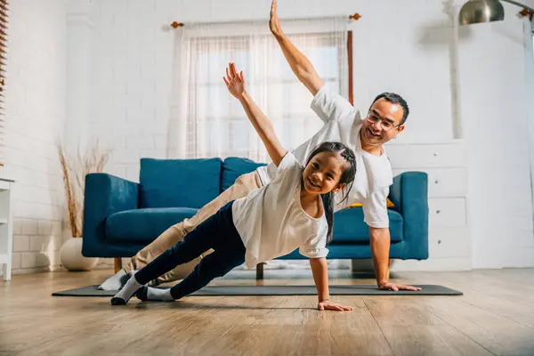 Father His Daughter Discover Happiness Yoga Home Promoting Togetherness Muscle Stok Foto