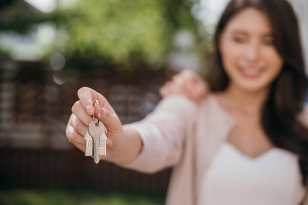 In real estate and moving a couples success is shown by keys carrying a mattress. Their happiness signifies the joy of a successful relocation. Moving Day Concept