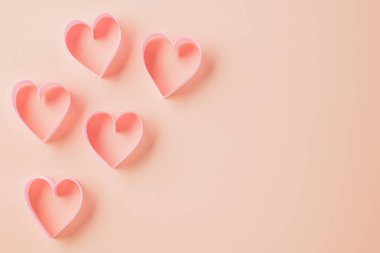 Happy Valentines Day. Flat lay pink ribbon heart shaped on pastel pink background, Festive background with copy space, Valentines day concept