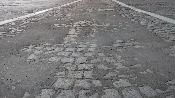 Sokaklarda yol kaldırım Paris, Fransa. Taş ve asfalt