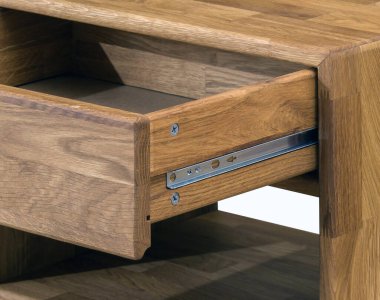 Drawer with a slider close view photo, wooden eco furniture elements background. Solid wood furniture details