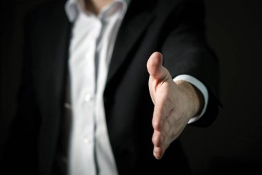 Yakın plan arkaplanı ile tokalaş. İş anlaşması, anlaşma konsepti