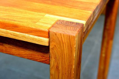 Wooden furniture surface, natural hardwood furniture close view photo background. Eco furniture production concept