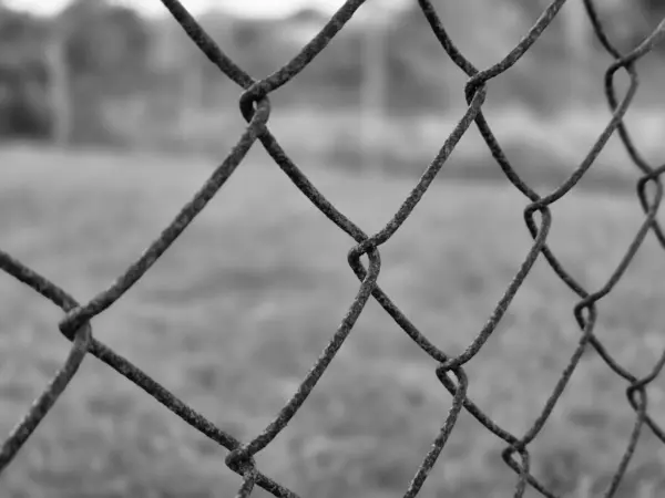 stock image Rusty fence grid close view background. Black and white monochrome grayscale photo