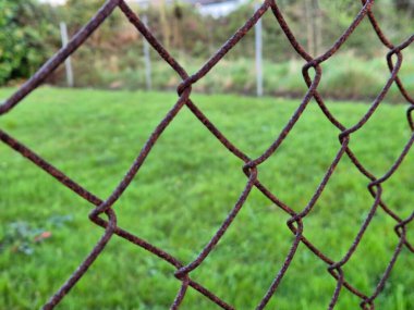 Rusty fence grid close view background clipart