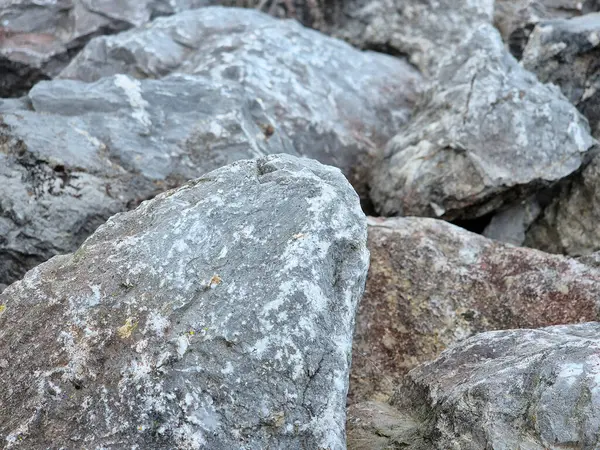 stock image Natural stones close view background, pile of stones pattern