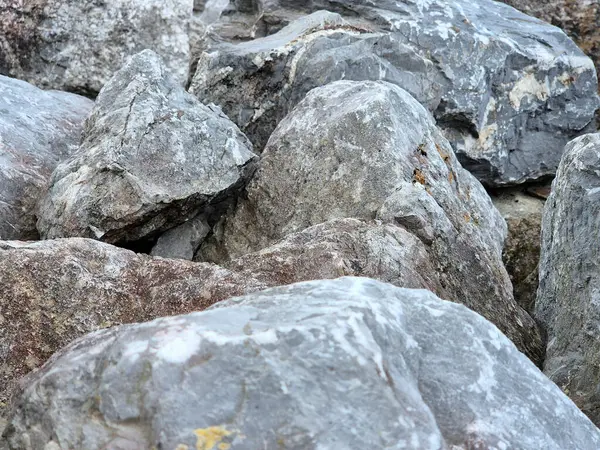 stock image Natural stones close view background, pile of stones pattern