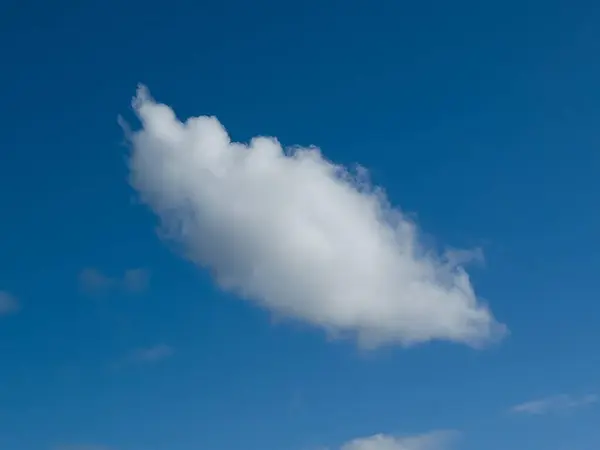 stock image Summer white fluffy cumulus clouds in the deep blue sky