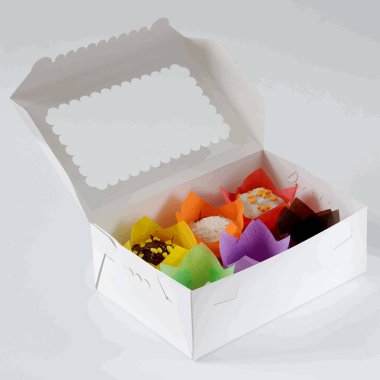 Box with tulip forms, confectionery object isolated over white background clipart