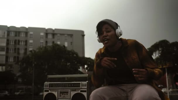 African Girl Having Fun Singing While Listening Music Headphones Vintage — Vídeos de Stock