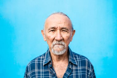 Portrait of a Senior man looking into the camera - Elderly people lifestyle concept clipart