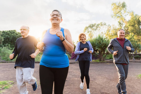 Group Diverse Senior People Jogging Together Park Stock Picture